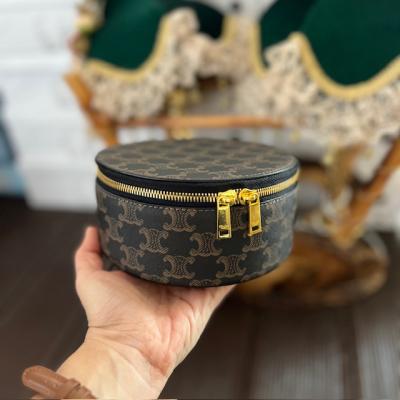 CLNE MONOGRAM YUVARLAK KUTU ÇANTA 